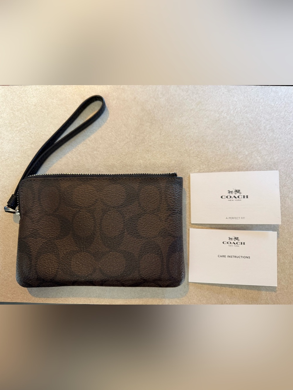 Coach Brown Signature Canvas Wristlet with Black Strap